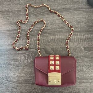 Mario Valentino handbag. Comes with dust bag. In great condition. Made in Italy.